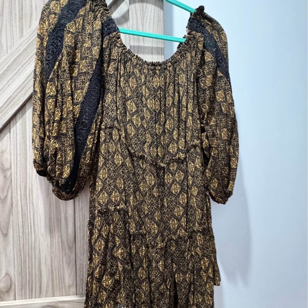 Tanoa Elegant Black and Gold Patterned Dress